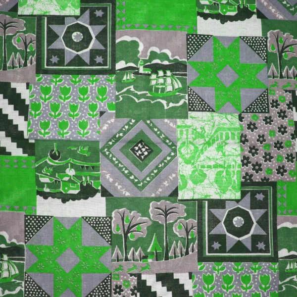 Zielona patchworkowa tkanina.