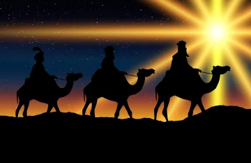 Grafika przedstawia trzy postacie na wielbłądach. Są wyciemnione i jadą w stronę świecącej się gwiazdy. Są to trzej królowie zmierzający w stronę gwiazdy betlejemskiej.